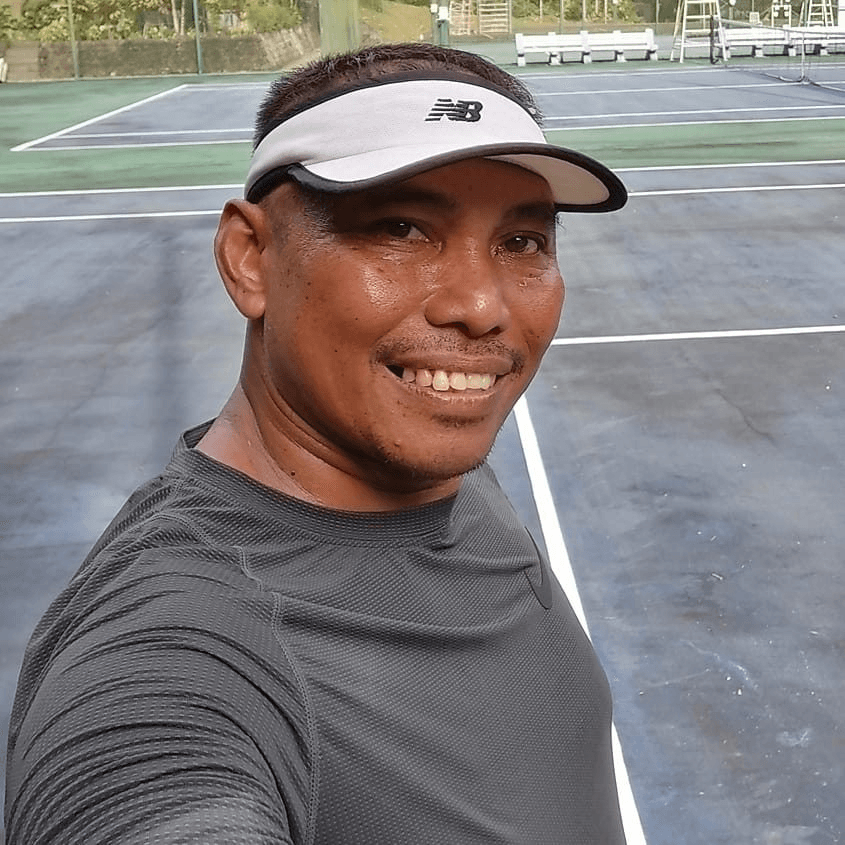 Coach Juz on court